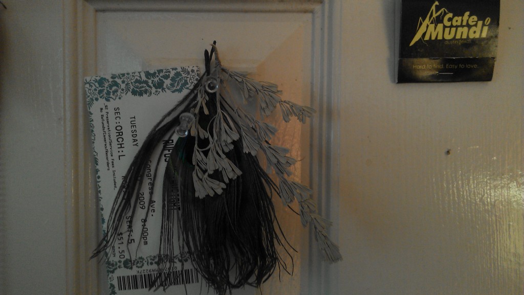 ticket and feather